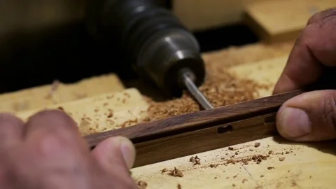 Woodwork - carpenter working with plane and wood plank at workshop Stock Footage 81485824