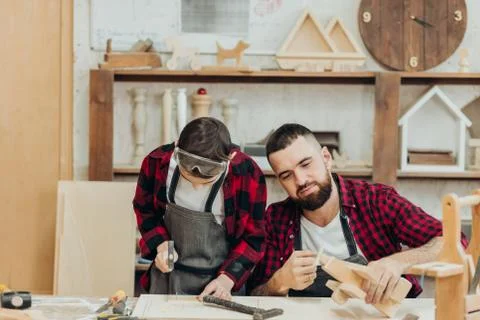 Woodwork classes for children and creativity concept Stock Photos