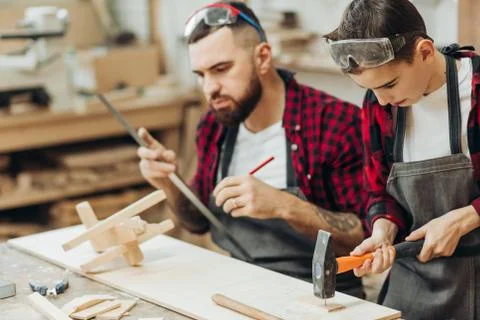 Woodwork classes for children and creativity concept Stock Photos