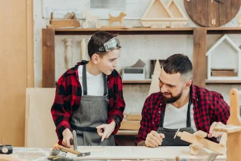 Woodwork classes for children and creativity concept Stock Photos