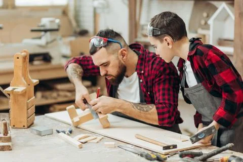 Woodwork classes for children and creativity concept Stock Photos