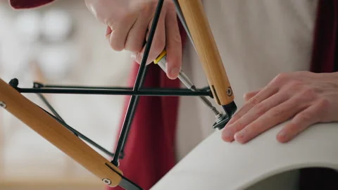 Woodwork, Owners In progress Assembling furniture by driving a screw with a Video stock 243006987
