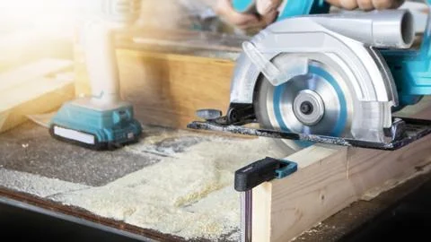 Woodwork that slides Using tools to slide the log, woodworking by a carpenter Stock Photos