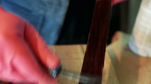 Woodworker Applying Glue to Boards Stock Footage 75951954
