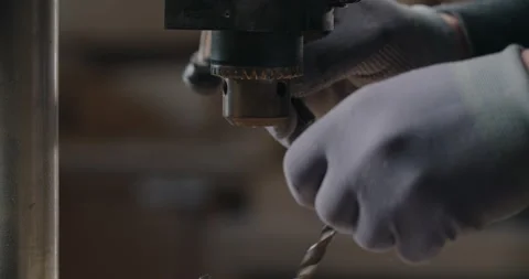 Woodworker change the drill in the drilling machine, carpentry at workshop Stock Footage 149300818