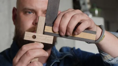 Woodworker Checks The 90 Degree Angle With Try Square. Carpenters Try Square Stock Footage 156683518