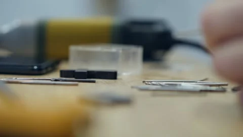 Woodworker chooses drill bits for wood processing machine Stock Footage 146572718