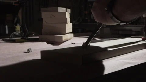 Woodworker chopping a mortise with a chisel on workbench, low angle Video stock 346253862