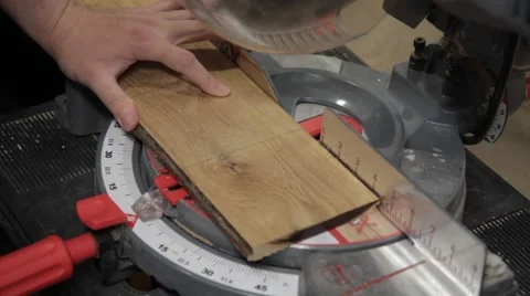 Woodworker cutting board on table saw 1 Stock Footage 42234742
