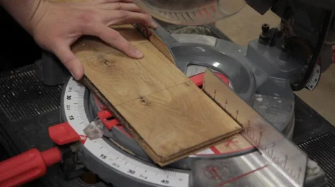 Woodworker cutting board on table saw 2 Stock Footage 42235008
