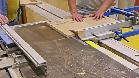 Woodworker cutting board on table saw Видео 337550208