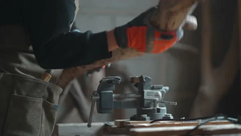 Woodworker fixing wood in vice at table Stock Footage 167422871