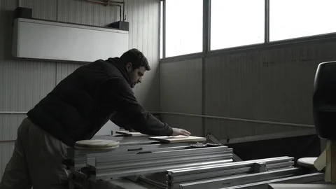 Woodworker installing wooden components on cnc machine, industrial production. Stock Footage 87803954