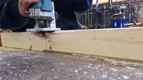 Woodworker Routing Timber in Carpentry Workshop Stock Footage 337550165