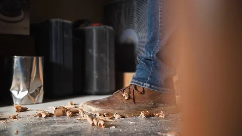 Woodworker using a plane (Feet Shot) Stock Footage 124332951
