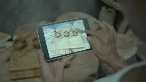 Woodworker Using Tablet to Take Photos of  Wooden Crafts for Online Marketing Vídeos de archivo 333676378
