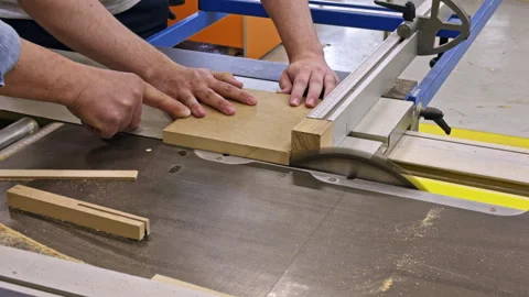 Woodworkers cutting board on table saw Stock Footage 337551505