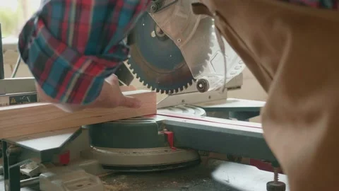 Woodworking in Action: Crafting with Precision Stock Footage 314455948