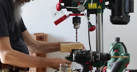 Woodworking, bench drill use, fixing wood block Stock Footage 241566225