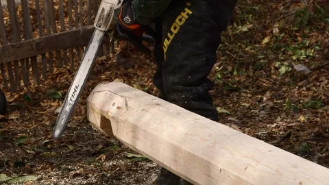 Woodworking with a chainsaw Stock Footage 91988485