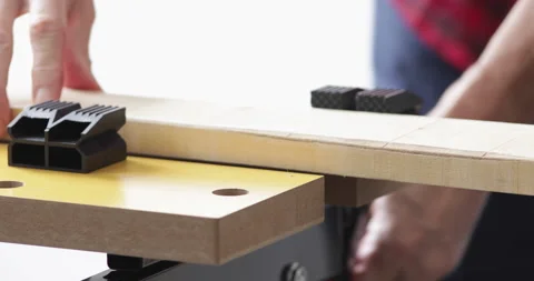 Woodworking, fixing lumber plank into workbench vise grip Stock Footage 153282651