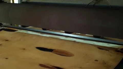 Woodworking machine cuts raw materials in a factory Stock Footage 292932248