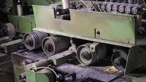 A woodworking machine at a factory processes a board Stock Footage 319428737