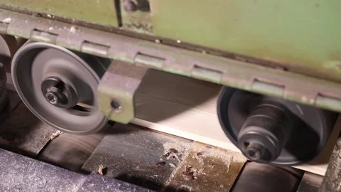 A woodworking machine in a factory processes a large plan Stock Footage 319428682