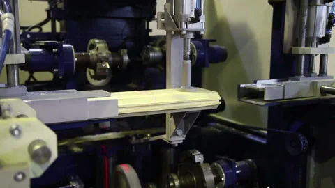 The woodworking machine fixes the part and Milles two grooves on the wooden Stock Footage 124723165