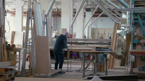 Woodworking manufacture with computerized automatic machinery. Stock Footage 296542230
