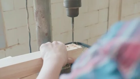 Woodworking Process: Drilling into Wood with Precision Stock Footage 327577909