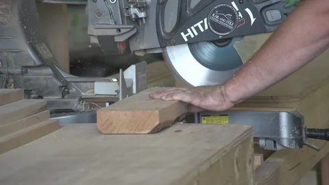 Woodworking Shop using  a Carbide Mitre Saw Stock Footage 109848033