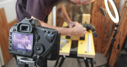 Woodworking vlogging, making wood clock, filming using smartphone an dslr Stock Footage 154793787