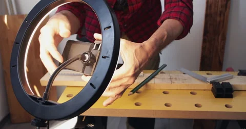 Woodworking vlogging, setting up gear, led ring-light and smartphone Stock Footage 153285155