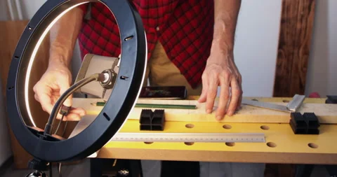 Woodworking vlogging, setting up gear, led ring-light and smartphone Stock Footage 153285419