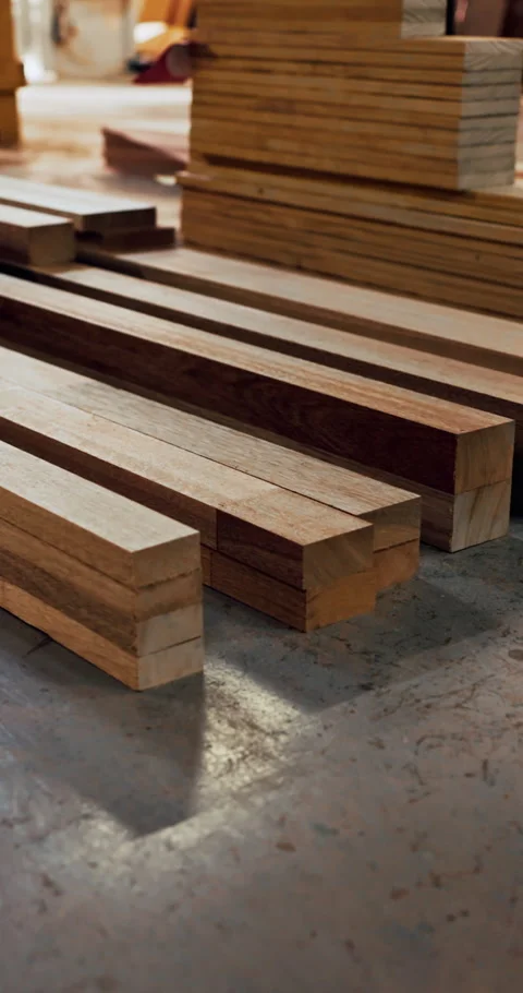 Woodworking, workshop and lumber stack on floor, manufacturing and material for Stock Footage 340884572