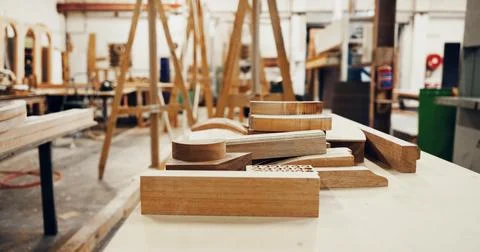 Woodworking, workshop and lumber stack on table, manufacturing and material.. Stock Photos