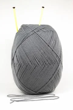 Wool and knitting needles. Stock Photos