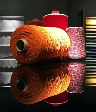 Wool bobbin of different colors and size. Stock Photos
