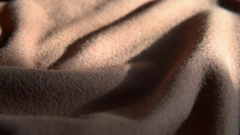 Wool cashmere background. Soft, brown, camel, woolen, clothes texture Stock-Footage 169425627