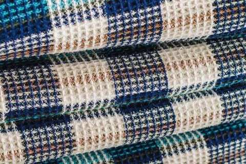 Wool fabric for a plaid with a pattern consisting of colored cells Foto stock