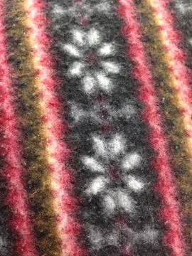 Wool fabric with striped snowflake pattern Stock Photos