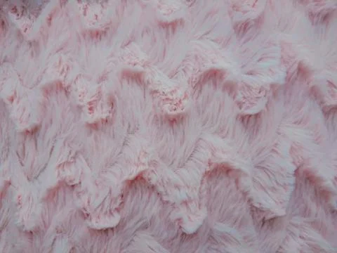 Wool fabrics. The pink wool. Wool is soft. Stock Photos