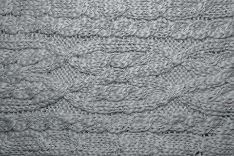 Wool hand-knitted or machine knitting pattern. Stock Photos