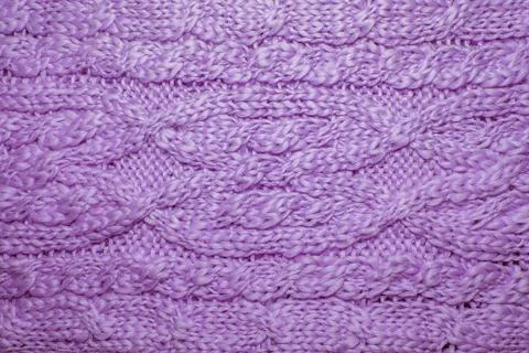Wool hand-knitted or machine knitting pattern. Stock Photos