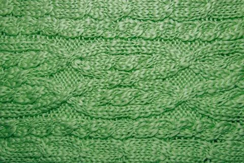 Wool hand-knitted or machine knitting pattern. Stock Photos