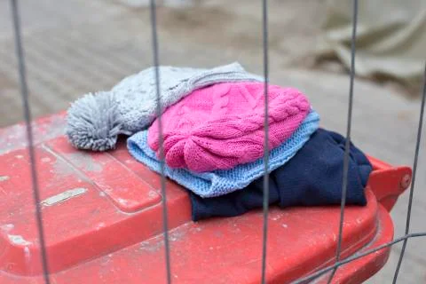 Wool hats on trashcan Stock-Fotos