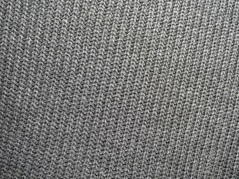 Wool knitted fabric design Stock Photos
