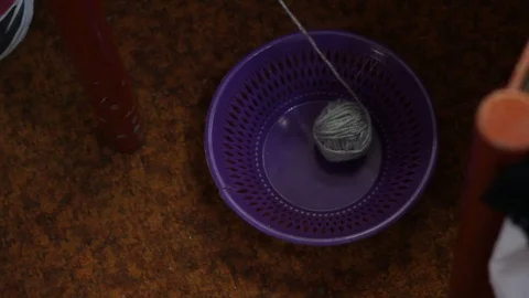 Wool for knitting in a plastic basket Stock Footage 87266197