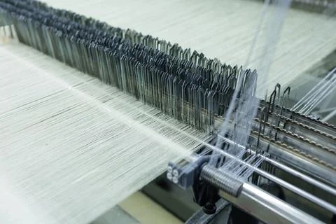 Wool Production Process in a Weaving Factory with Spinning Machine Stock Photos